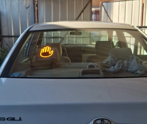BackHand installed on a rear windshield